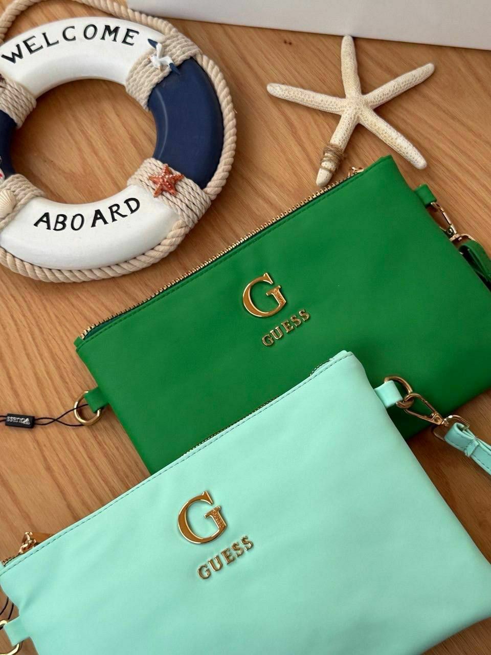 clutch hand bag guess